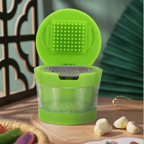 Picador de ajo manual verde